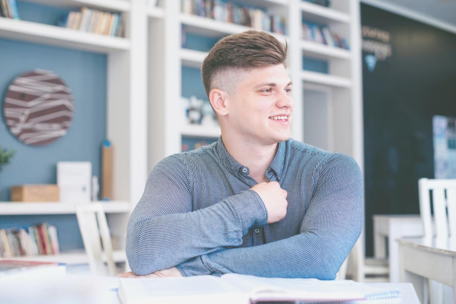 Developer workspace with multiple screens showing code and applications